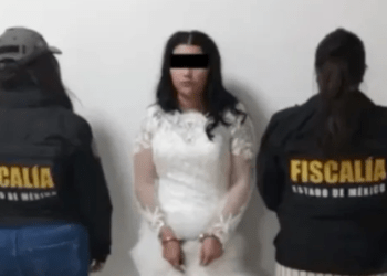 Nusja pozon me pranga pasi u a*rrestua ditën e dasmës për v*rasje